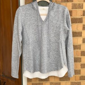 Sunday’s grey hooded sweater with side slit